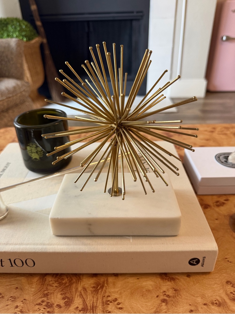 Gold Decorative Sculpture on White Marble Base